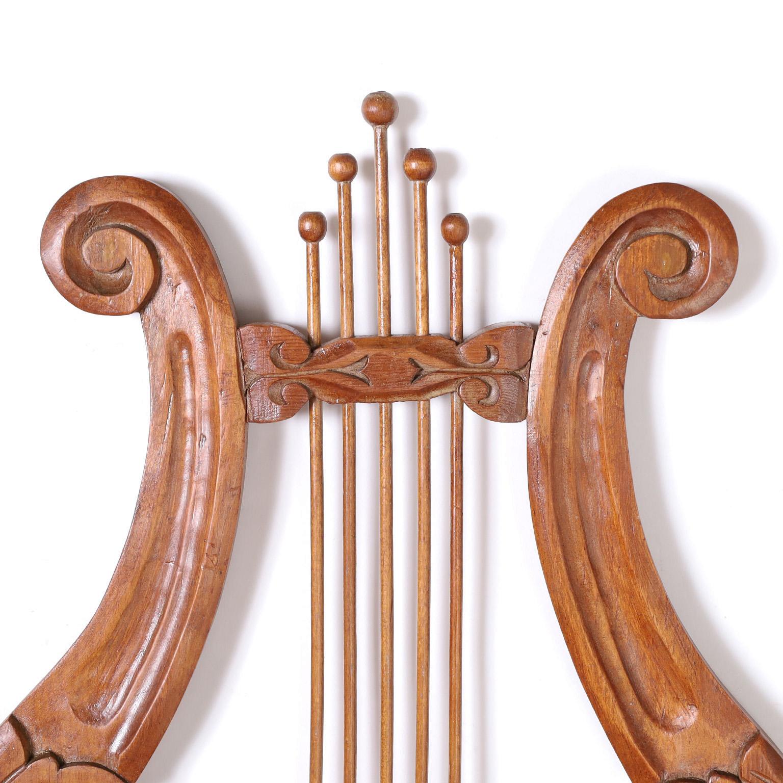 20th Century Pair of Carved Mahogany Lyre Form Wall Sconces For Sale