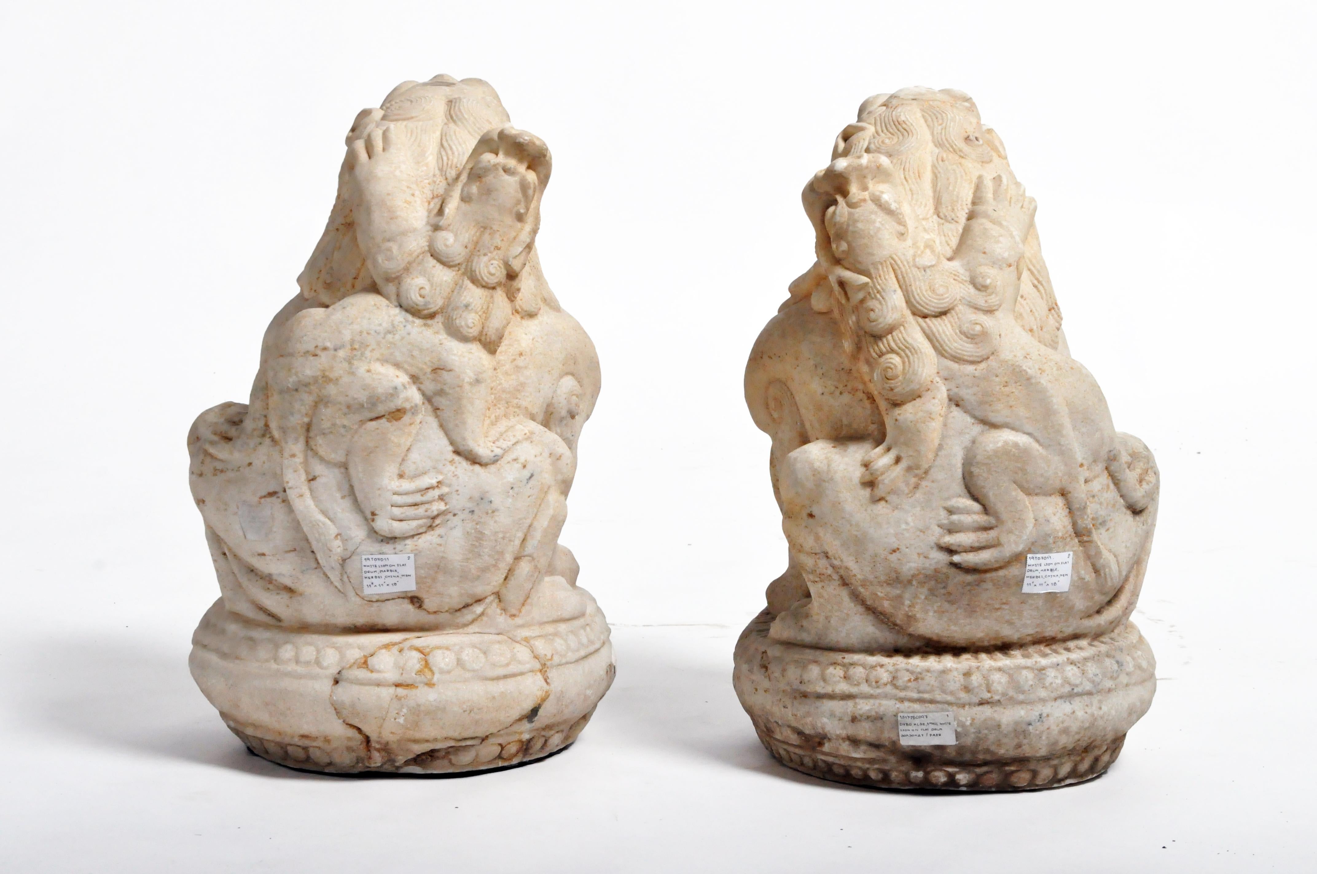 Pair of Carved Marble Fu Dogs on Pedestals In Good Condition In Chicago, IL