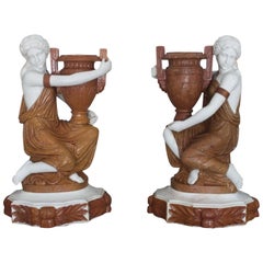 Pair of Carved Marble Water Carrier Sculptures