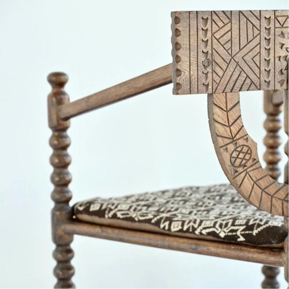 Unique pair of solid oak monk chairs with intricate carvings in Norse style. Hand crafted and unique with removable double sided upholstered cushions. Norway, circa 1950's.