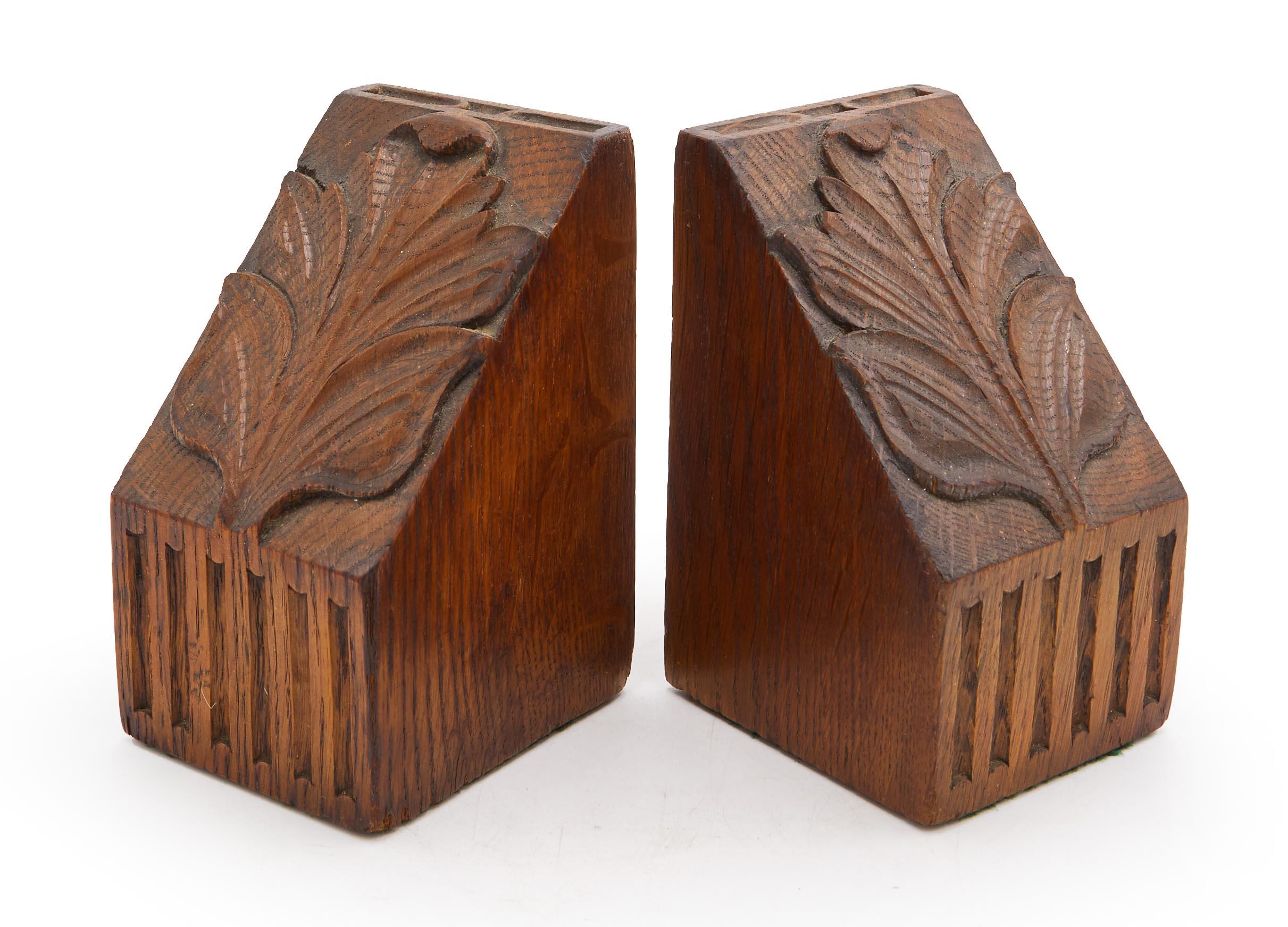 Pair of Mid-Century carved oak bookends with leaf designs (PRICED AS PAIR).