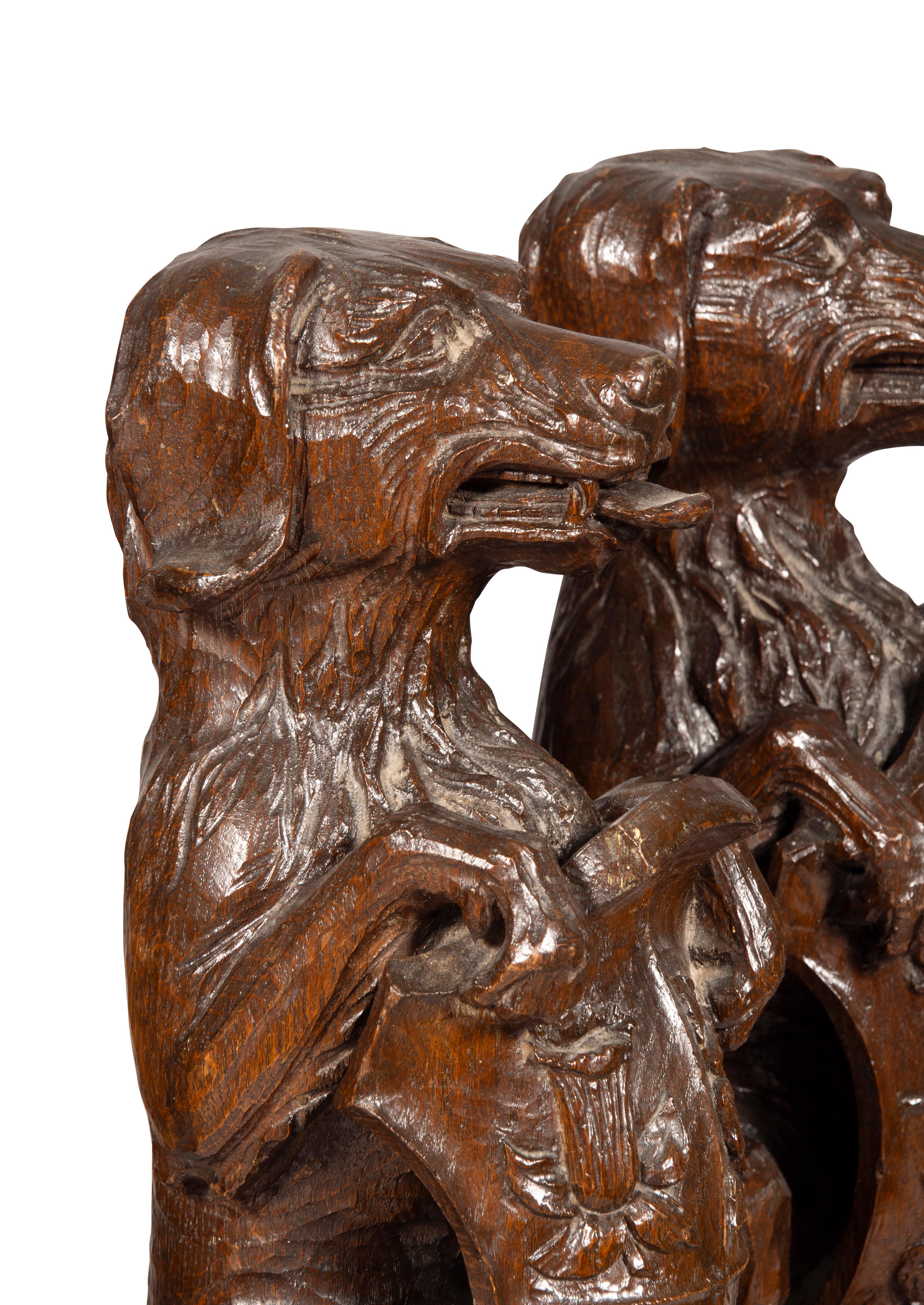 Pair Of Carved Oak Figures Of Seated Dogs With Shields For Sale 9