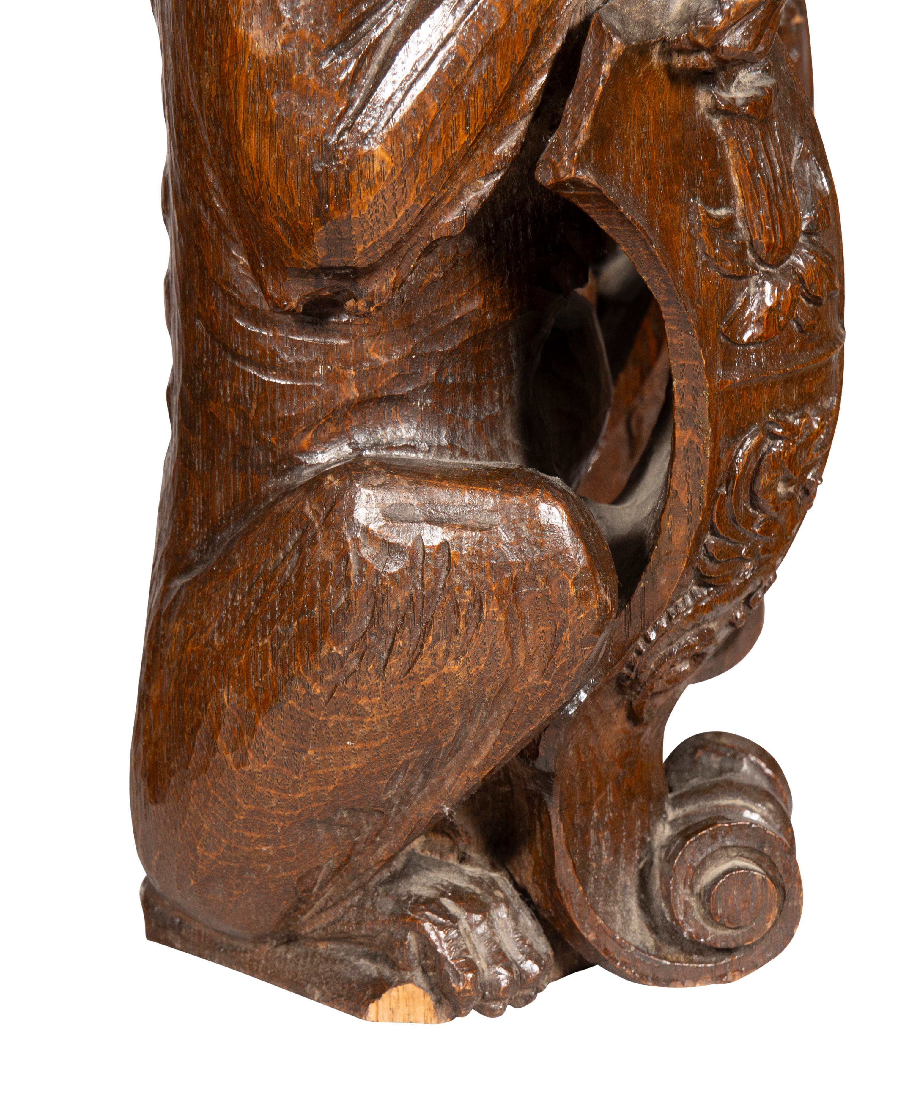 Pair Of Carved Oak Figures Of Seated Dogs With Shields For Sale 10