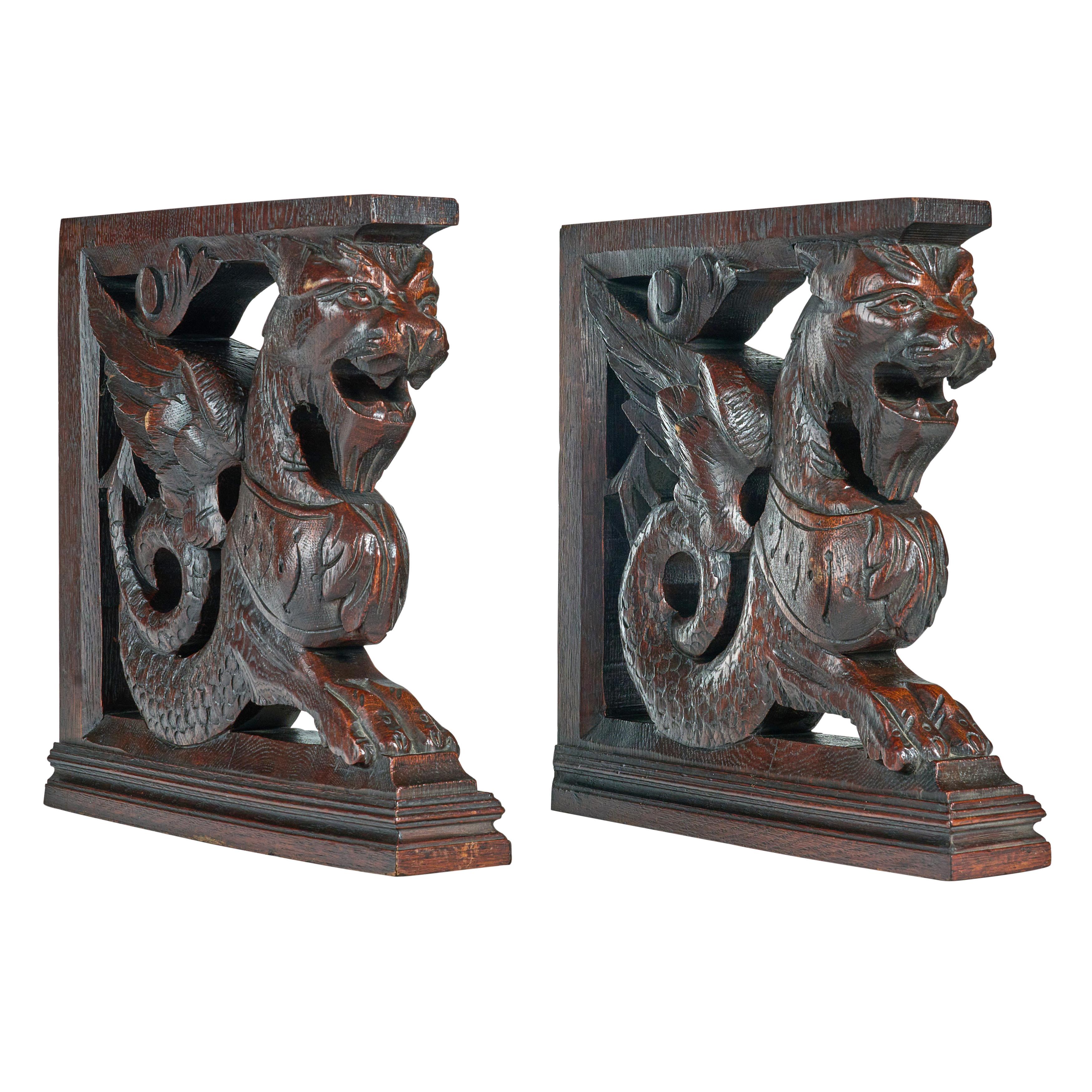 Pair of carved oak griffin brackets. These brackets were from a grand piece of furniture. Great condition. 