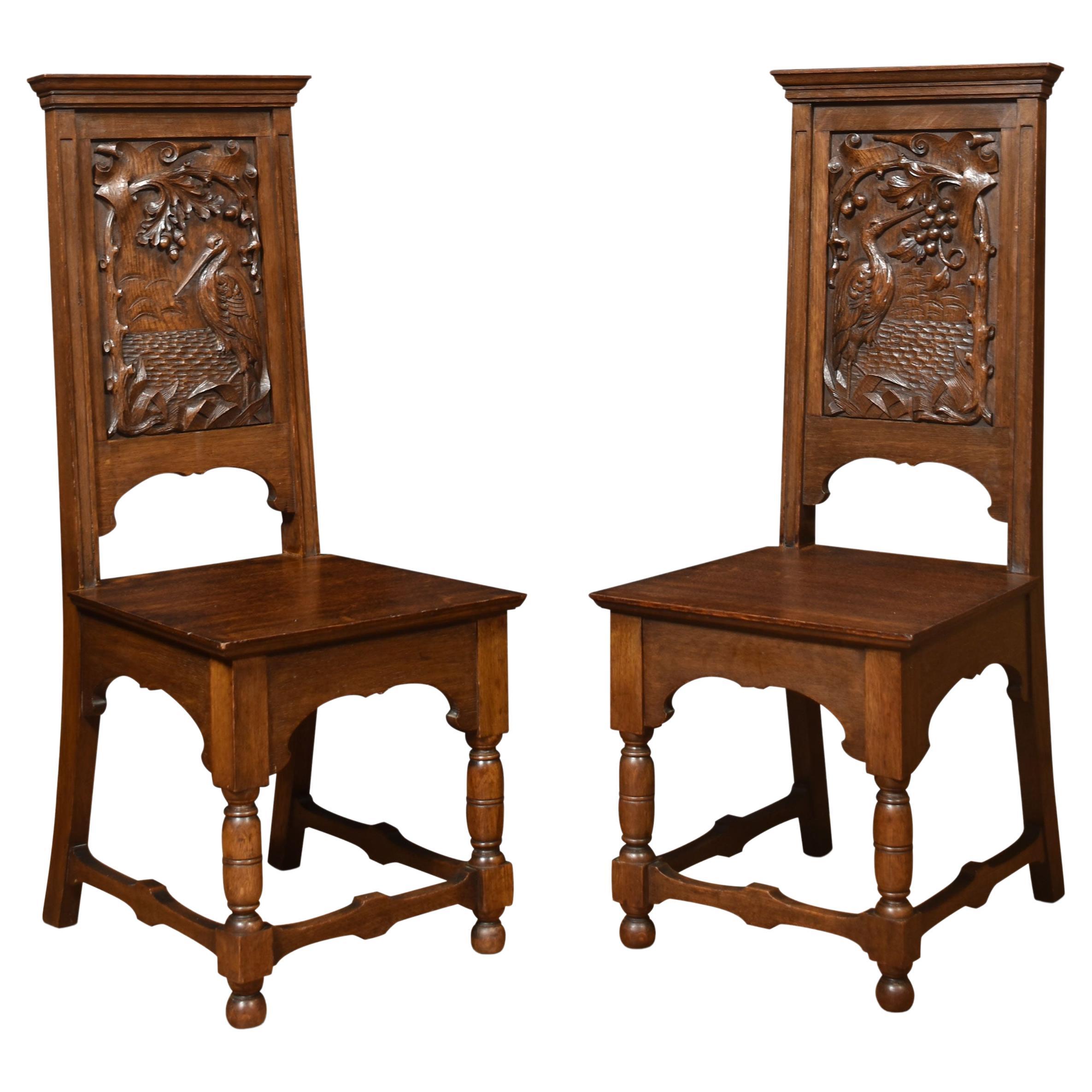 Pair of Carved Oak Hall Chairs For Sale