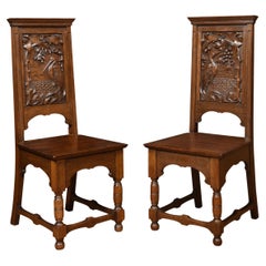 Pair of Carved Oak Hall Chairs