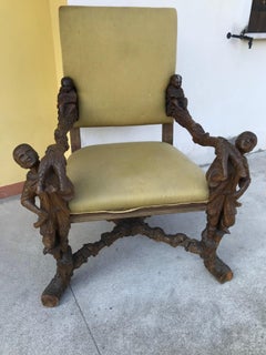 Pair of carved oak high chairs of the Andrea Brustolon genre