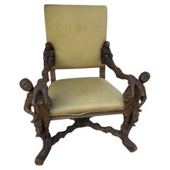 Pair of carved oak high chairs of the Andrea Brustolon genre