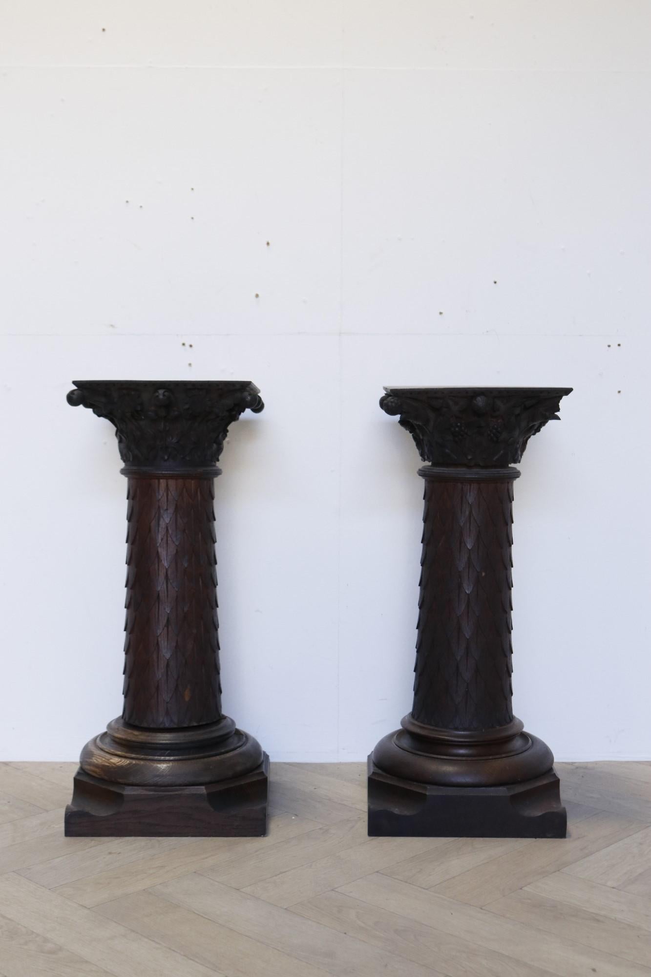 Hand-Crafted Pair of Carved Oak Pedestals For Sale