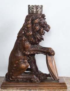Pair of Carved Oak Seated Lions