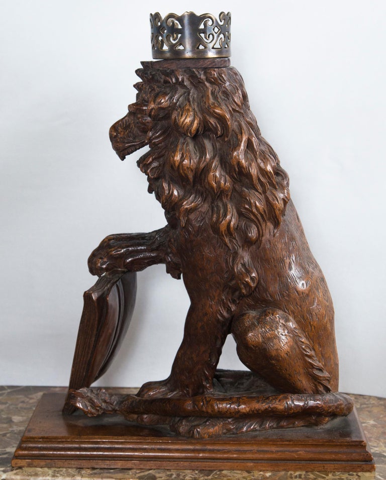 Pair of Carved Oak Seated Lions For Sale at 1stDibs