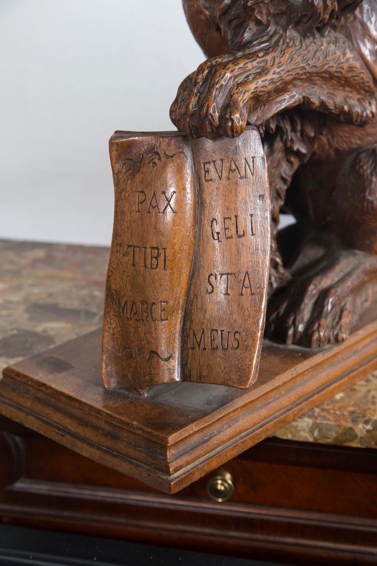 Pair of Carved Oak Seated Lions For Sale at 1stDibs