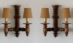 Paire d'appliques murales françaises en bois sculpté par Charles Dudouyt, années 1940