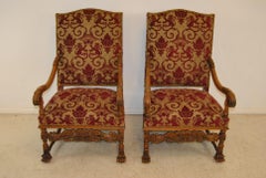 Pair of Carved Oak Upholstered Renaissance Style Armchairs