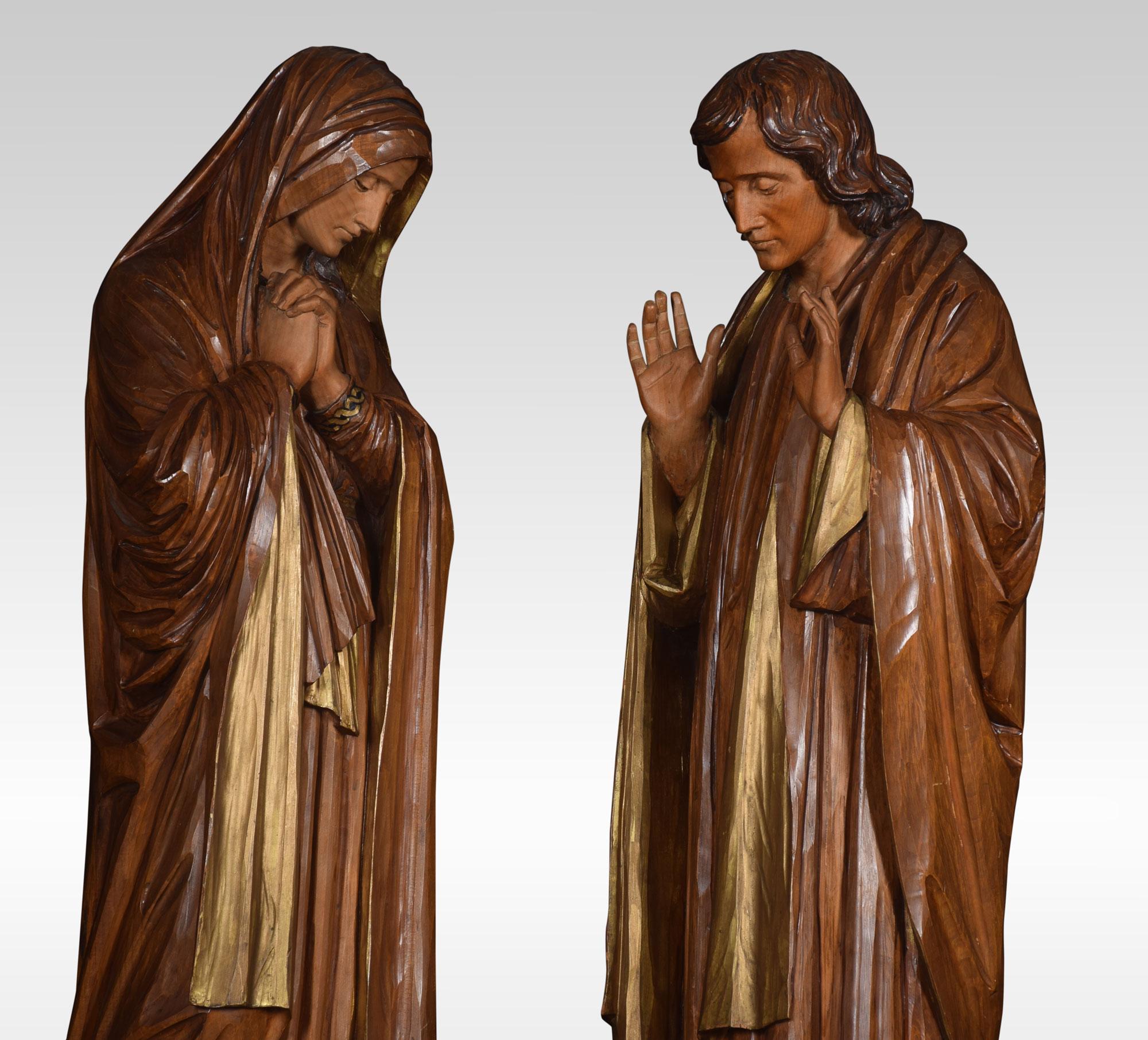 Large pair of carved polychrome decorated linden wood figures of Saints, the female wearing flowing robes, the male with his hands upturned. All raised up on octagonal bases.
Dimensions:
Female
Height 35 inches
Length 10 inches
width 8.5