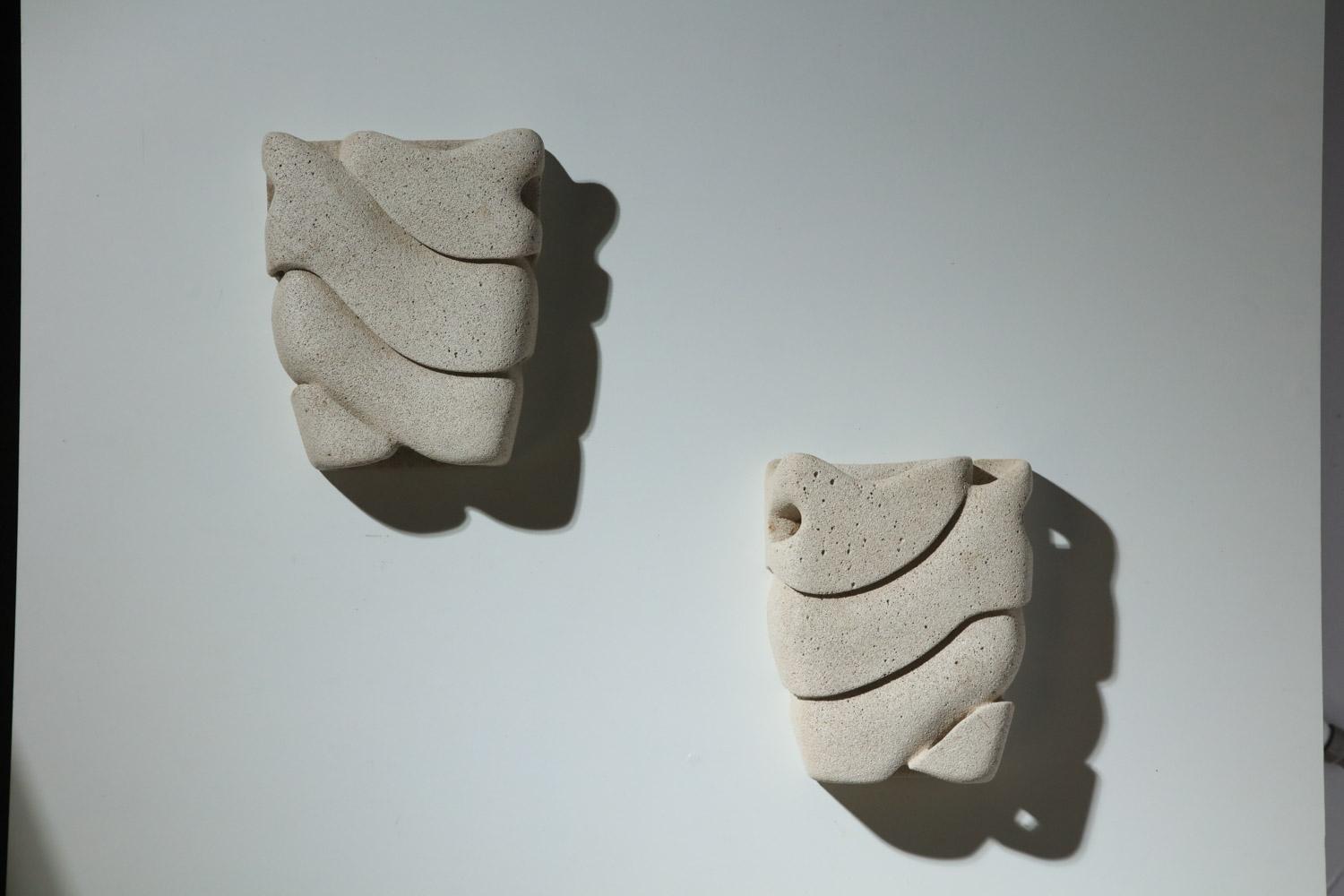 Pair of carved reconstituted stone wall lights, unsigned For Sale 2