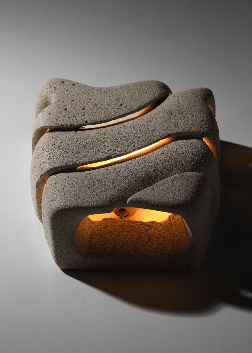 Hand-Crafted Pair of carved reconstituted stone wall lights, unsigned For Sale