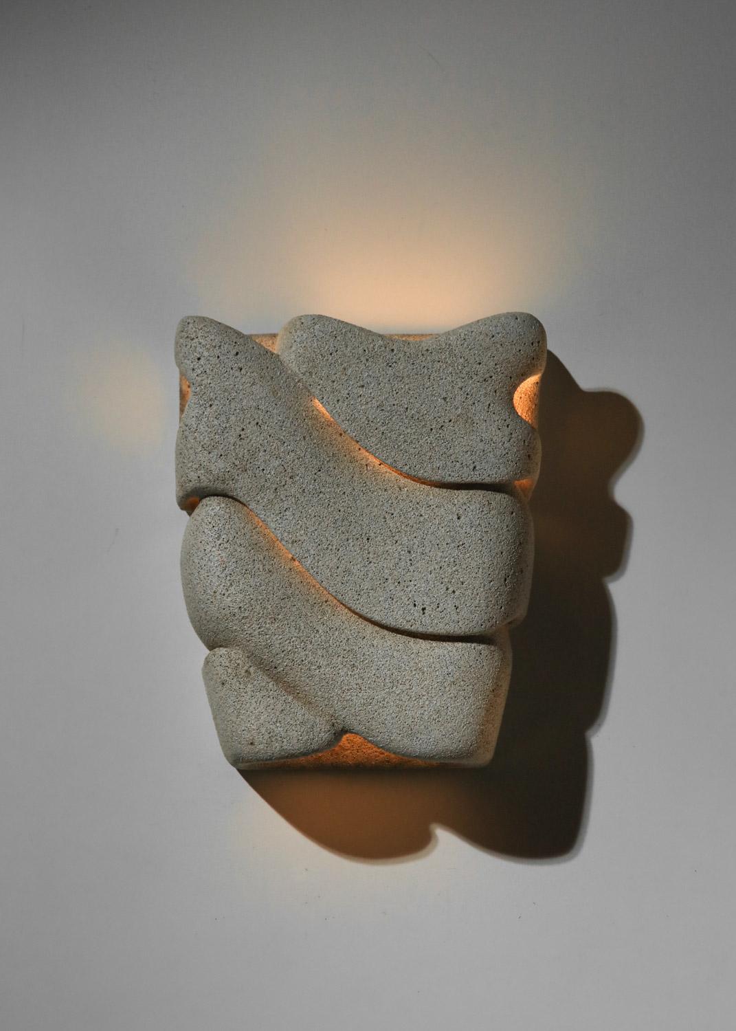 Pair of carved reconstituted stone wall lights, unsigned For Sale 1