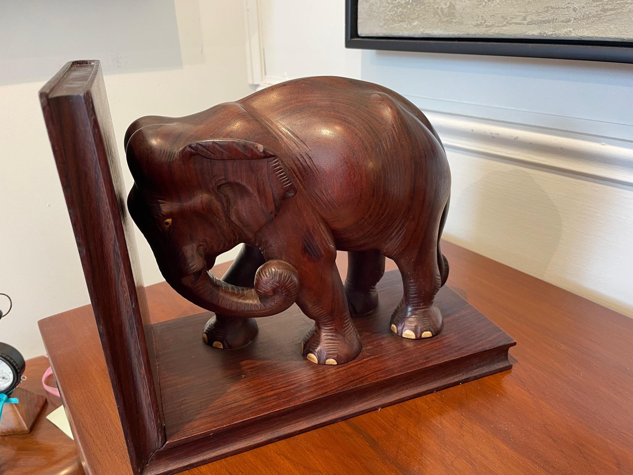 20th Century Pair of Carved Rosewood Elephant Bookends