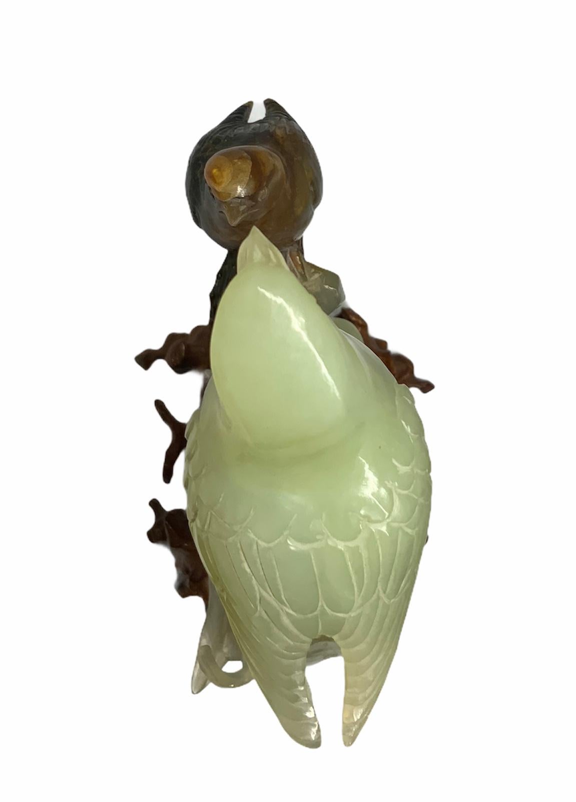 Chinese Pair of Carved Russet Jade Bird and Jade Parrot Sculptures