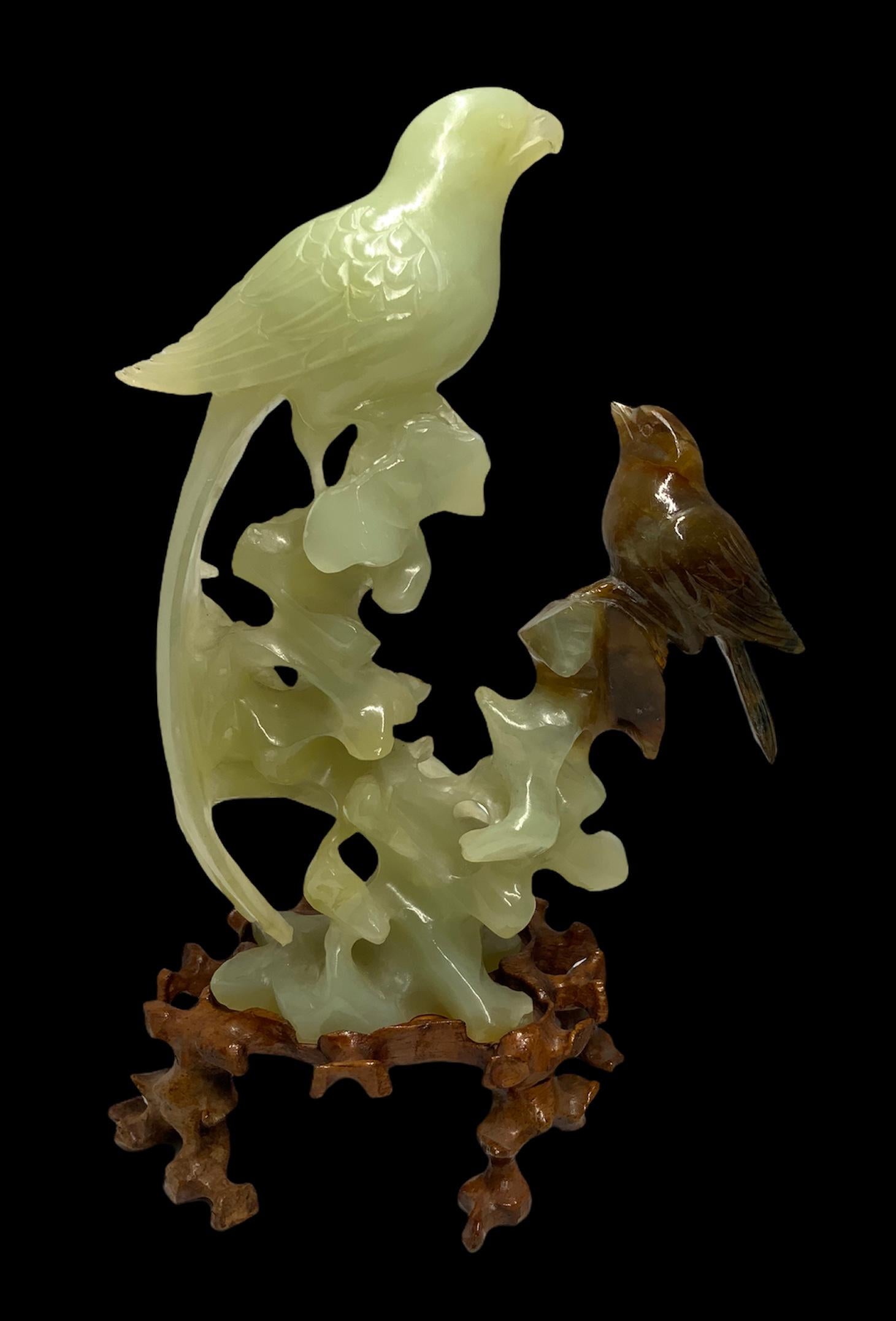 20th Century Pair of Carved Russet Jade Bird and Jade Parrot Sculptures