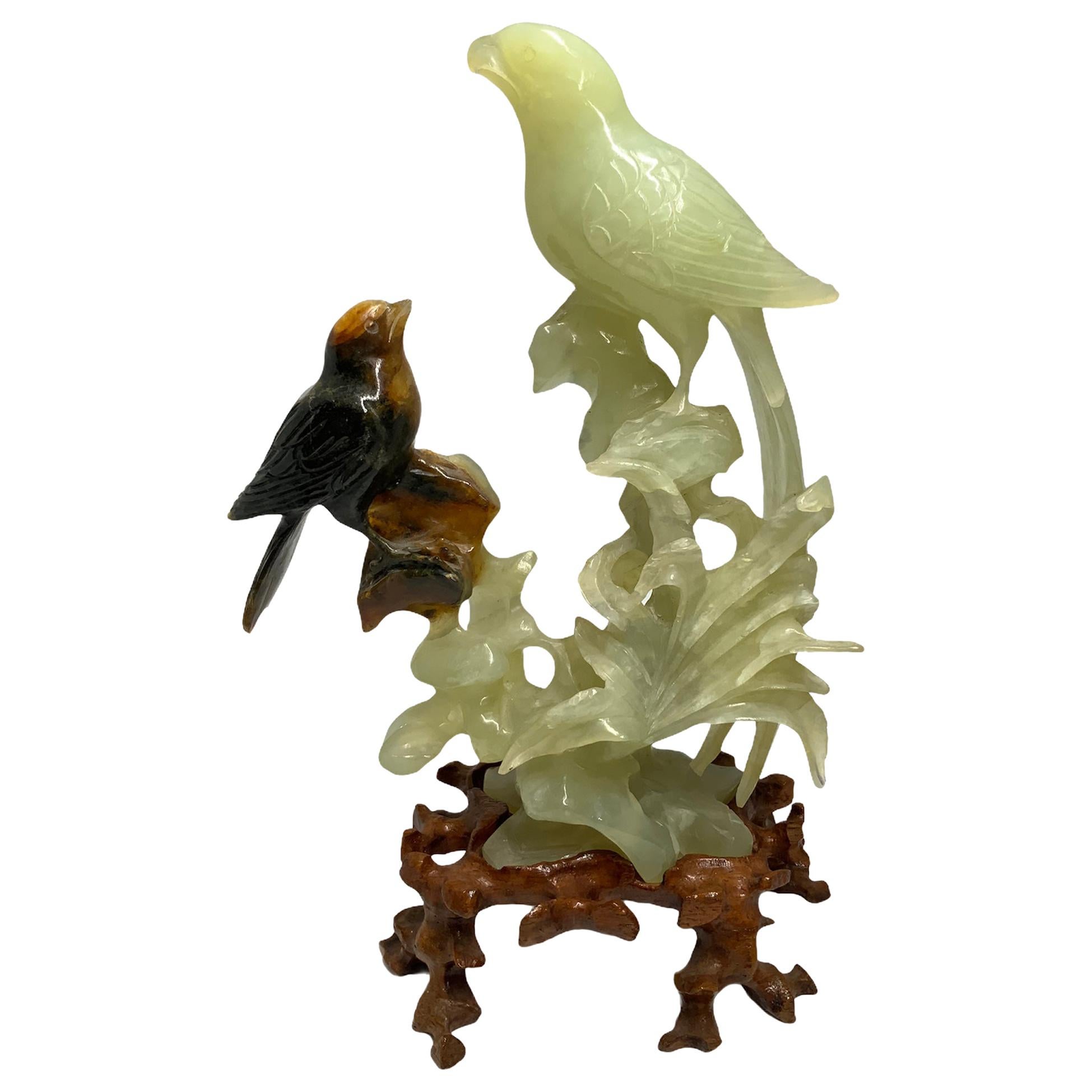 Pair of Carved Russet Jade Bird and Jade Parrot Sculptures