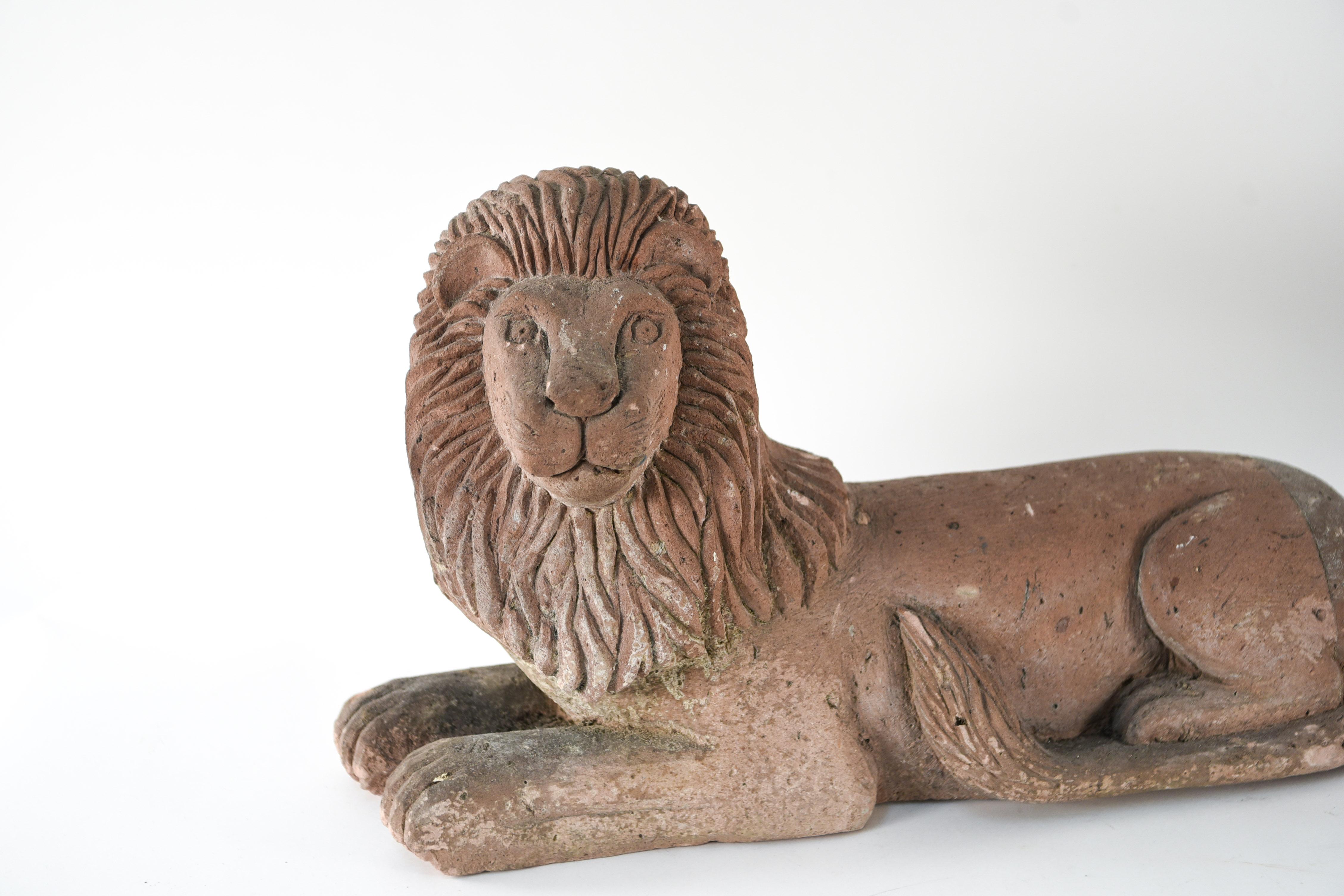 These resolute twin lions feature carved faces, textured coats, and a lovely terracotta color. They make excellent guardians of the garden or front stoop!