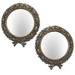 Pair of Carved Silver Giltwood Wreath Wall Mirrors