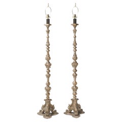 Pair of carved silver Leafed wood torchières floor lamps