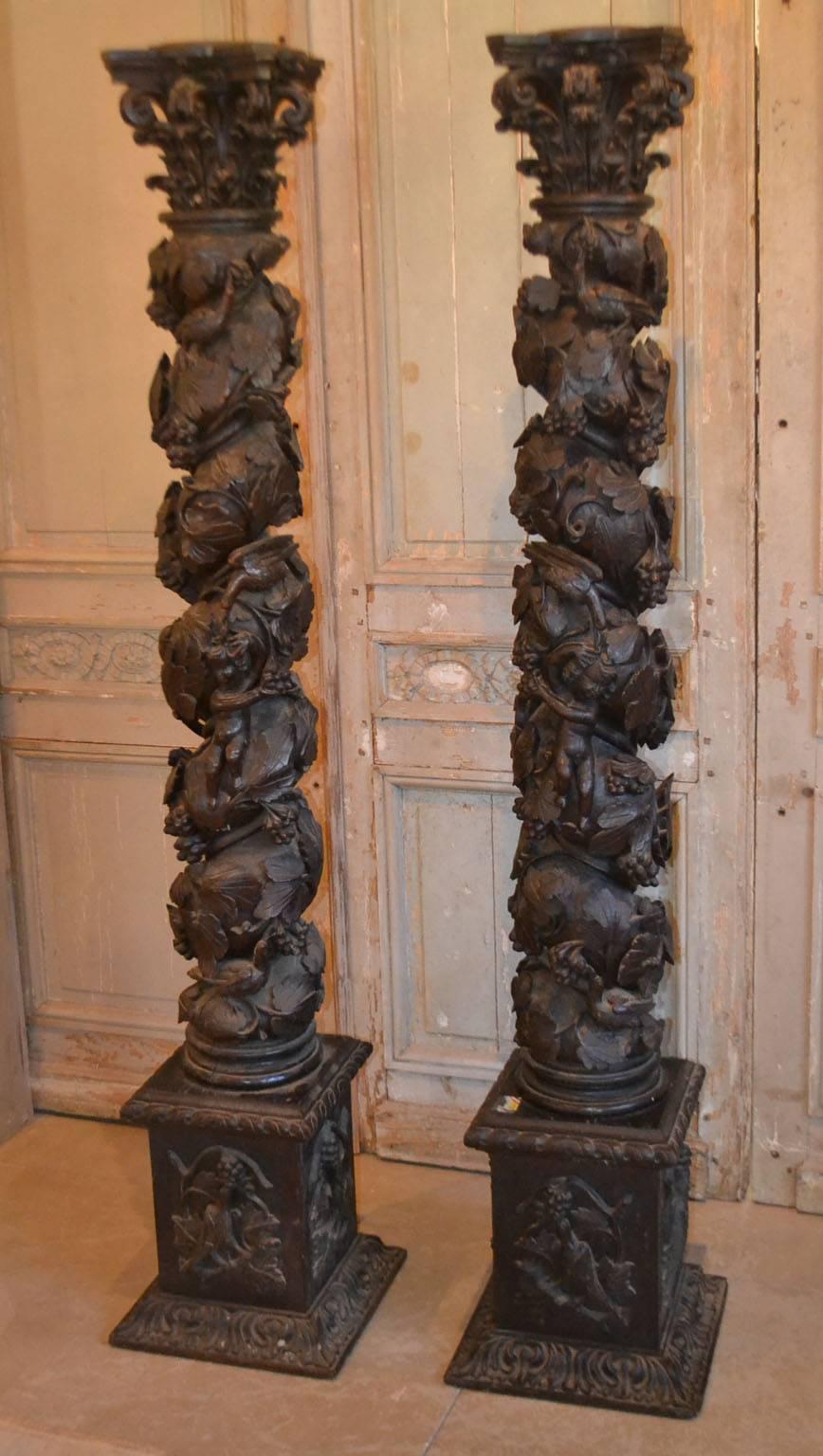 Pair of carved Solomonic columns. Carved with harvest and birds entwined around the columns. Topped with a carved capitol,
circa 1640.