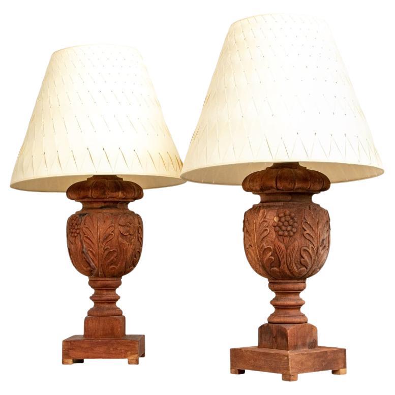 Pair Of Carved Teak Lamps With Woven Paper Shades in vendita