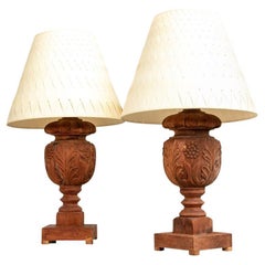 Pair Of Carved Teak Lamps With Woven Paper Shades