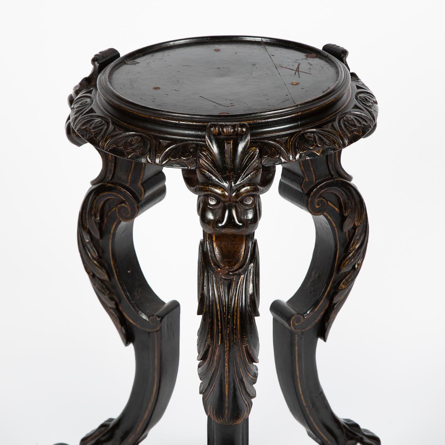 Ebonized Pair of Carved Tripod Vase Stands For Sale
