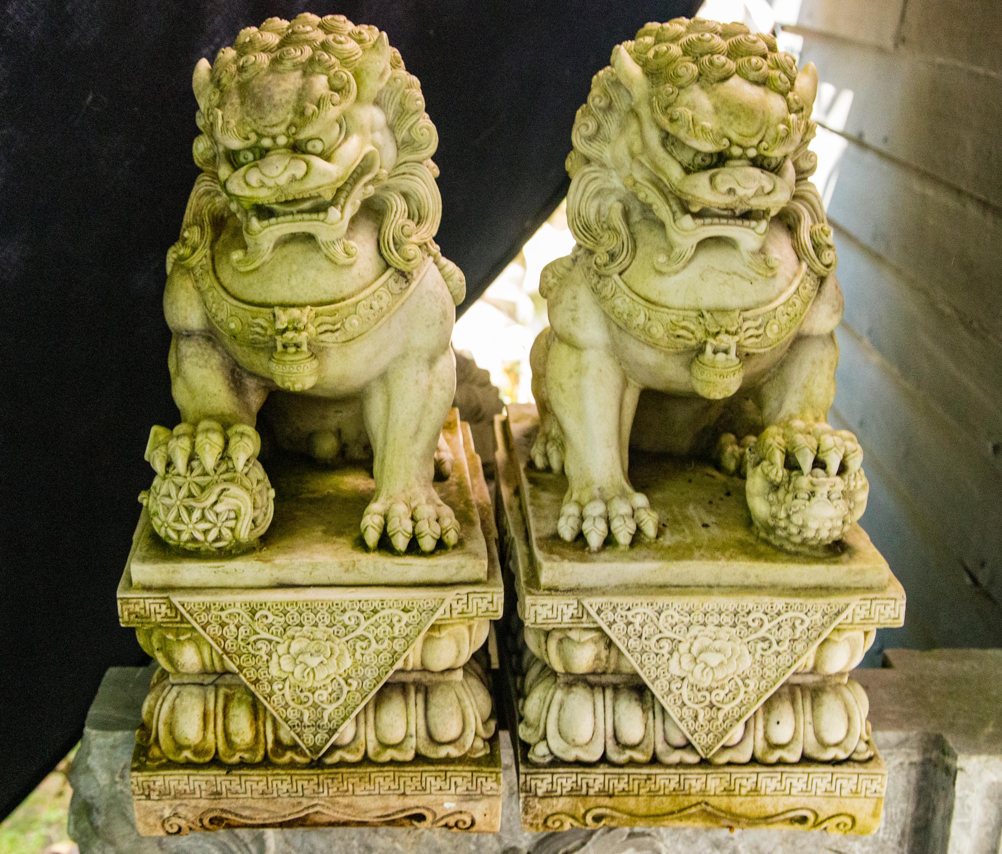 20th Century Pair of Carved White Marble Foo Dogs