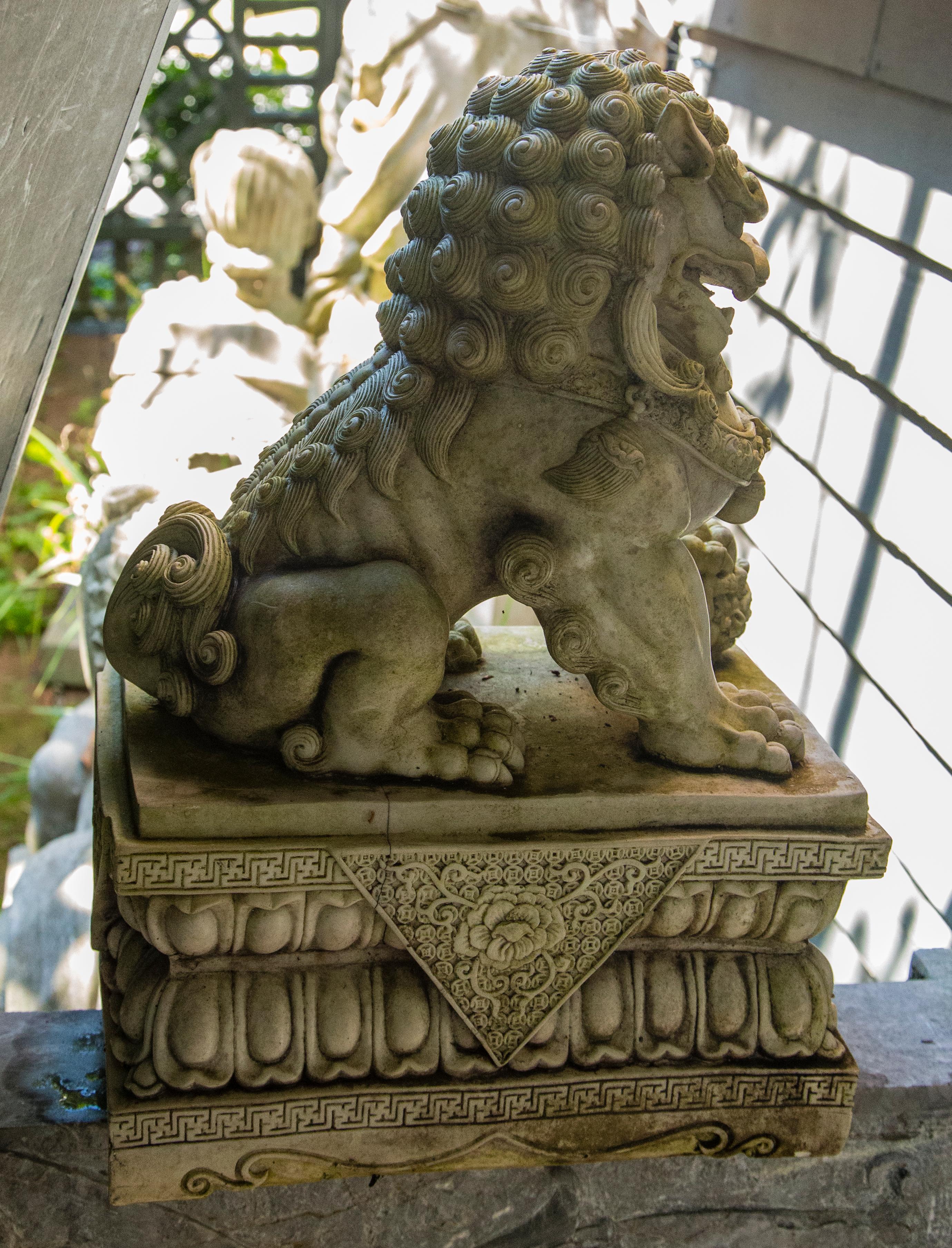 Pair of Carved White Marble Foo Dogs 1