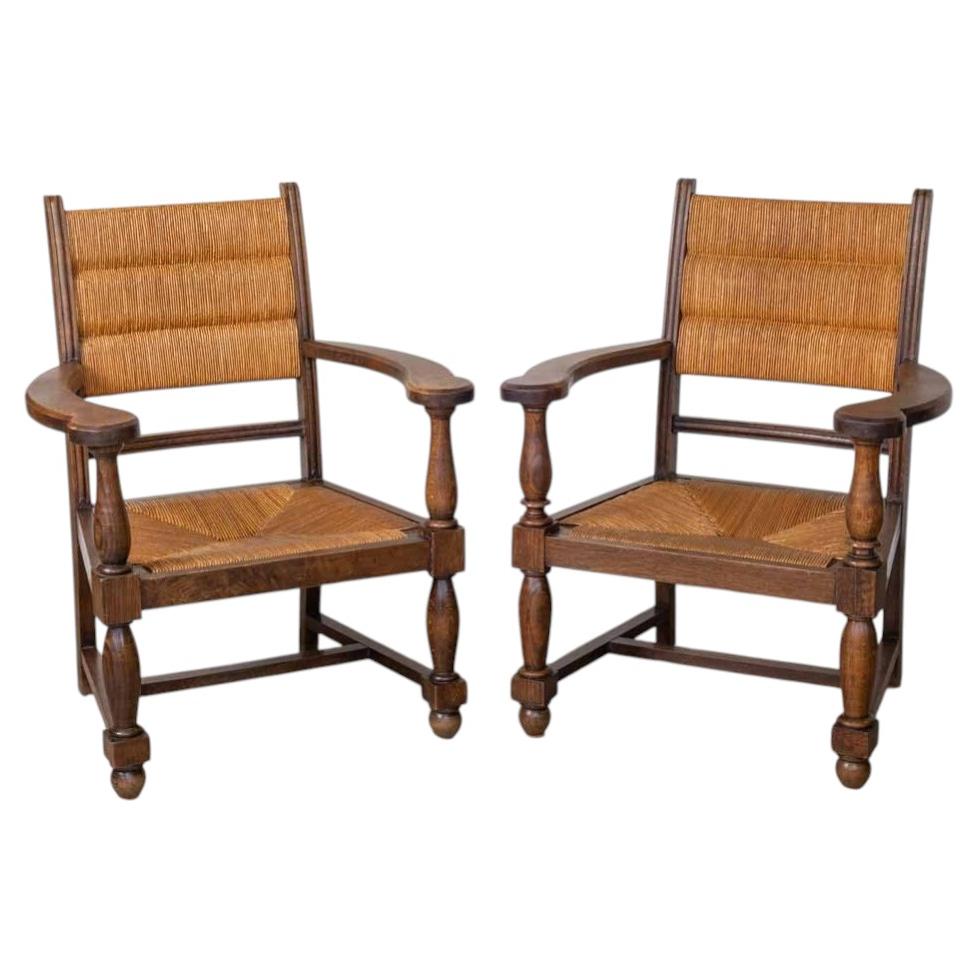 Pair of Carved Wood and Woven Chairs by Charles Dudouyt