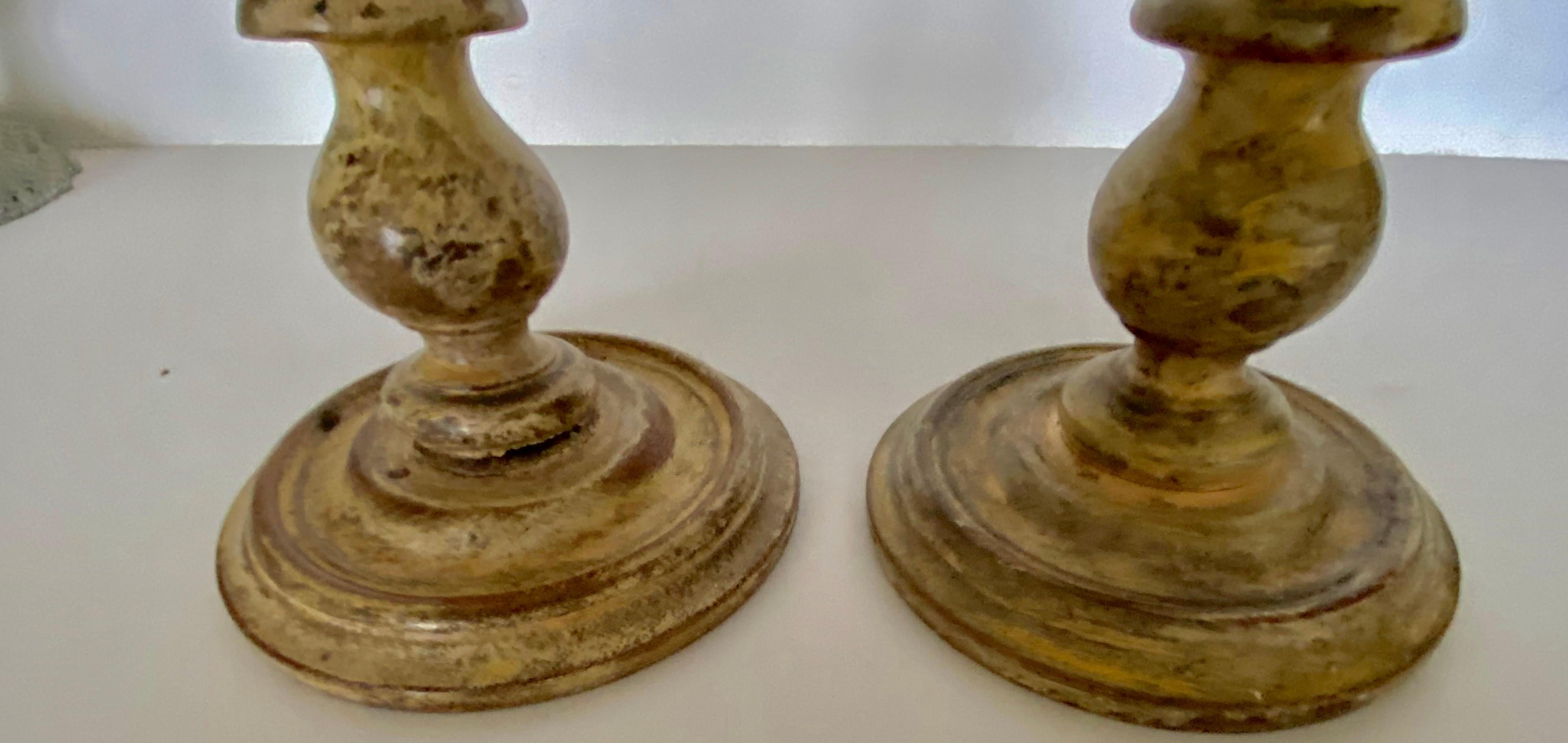 Pair of charming small painted turned carved wood candle holders or candlesticks.