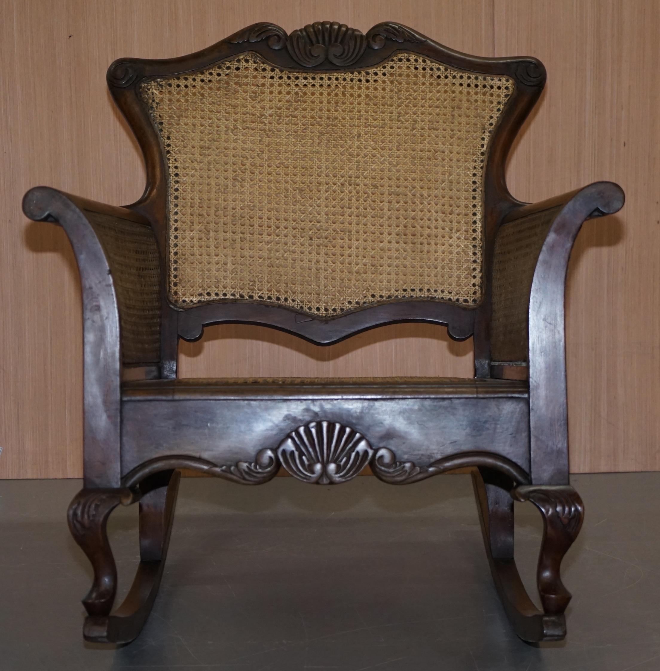 Art Deco Pair of Carved Wood circa 1920s Italian Berger Rattan Rocking Armchair Chairs
