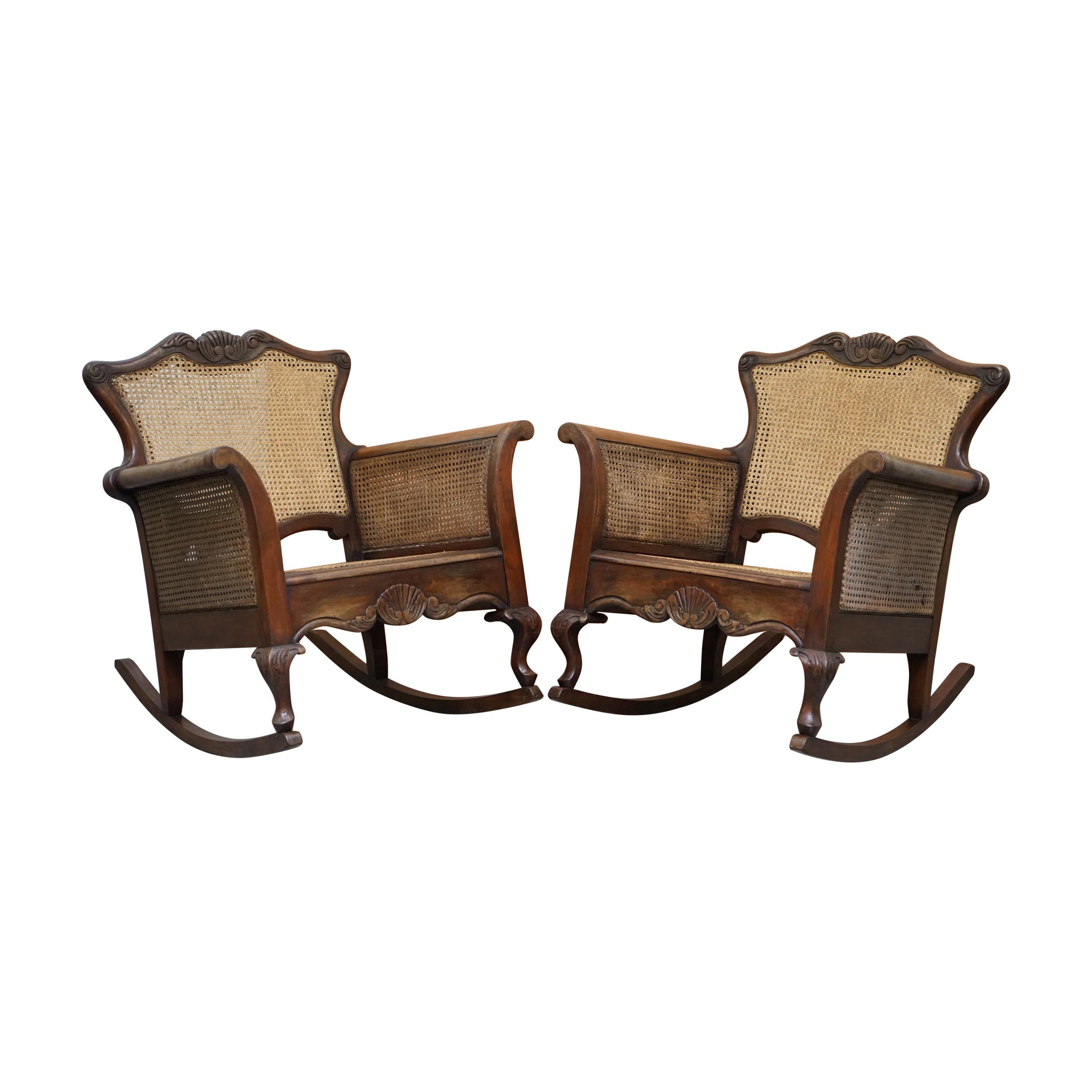 Pair of Carved Wood circa 1920s Italian Berger Rattan Rocking Armchair Chairs