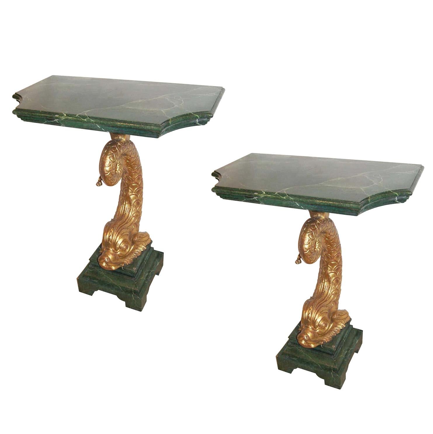 A pair of vintage Italian carved and giltwood faux marble-top console tables with dolphin-shaped bases. Sold individually.
Measurements:
Height 32