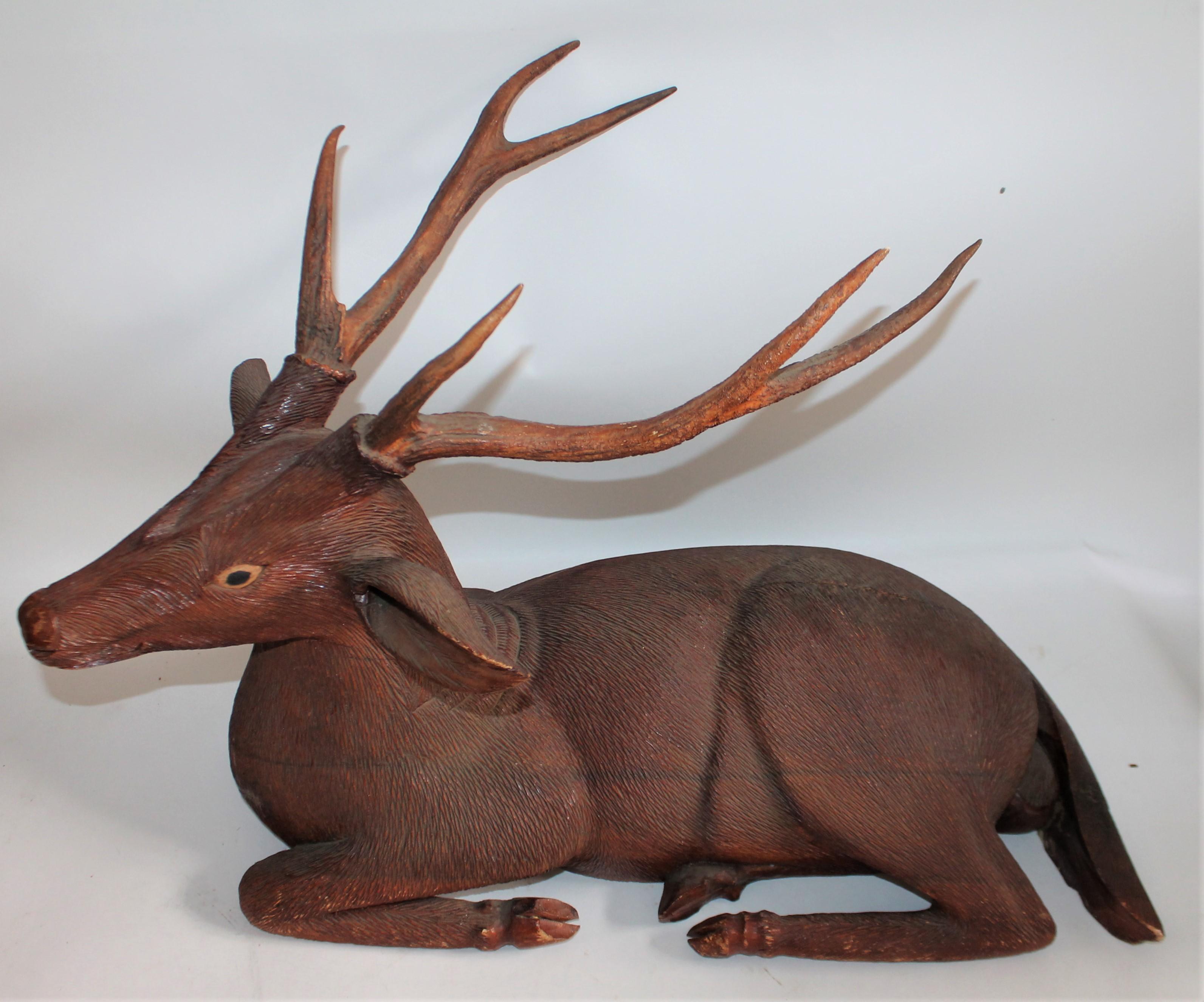 Hand-Carved Pair of Carved Wood Folk Art Deer For Sale