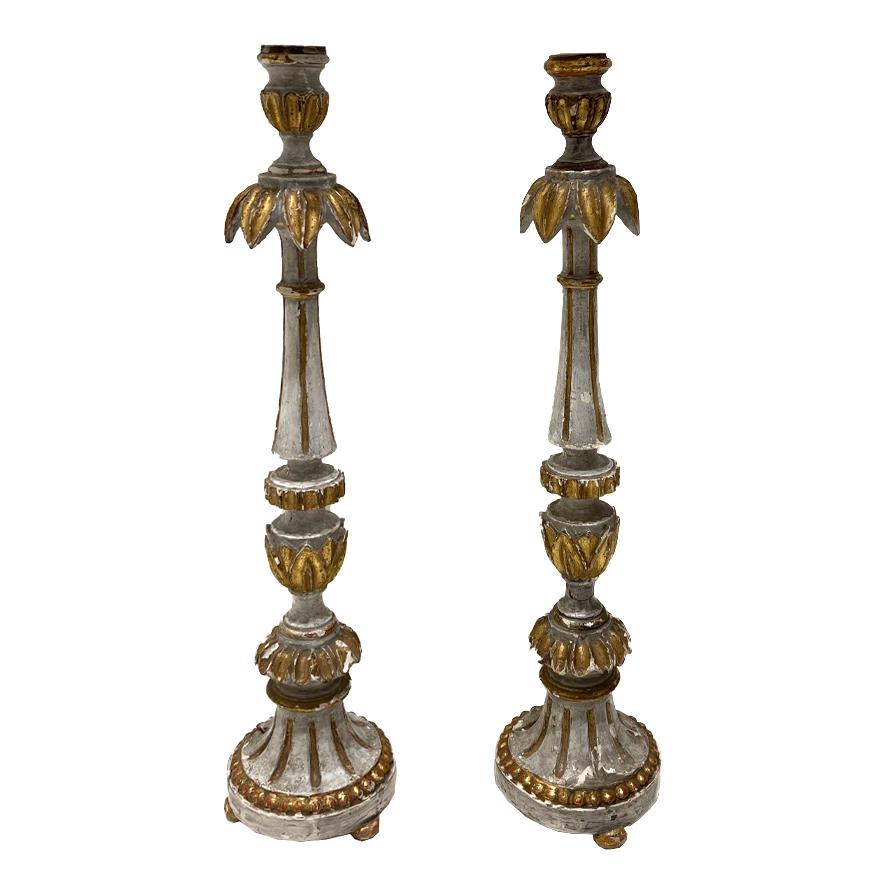Pair of beautiful wood gilded candlesticks from Europe.