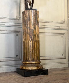 Pair of carved wooden columns in Louis XVI style, L’escalier de cristal, around