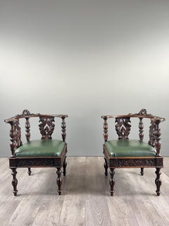 Pair of Carved Wooden Corner Armchairs