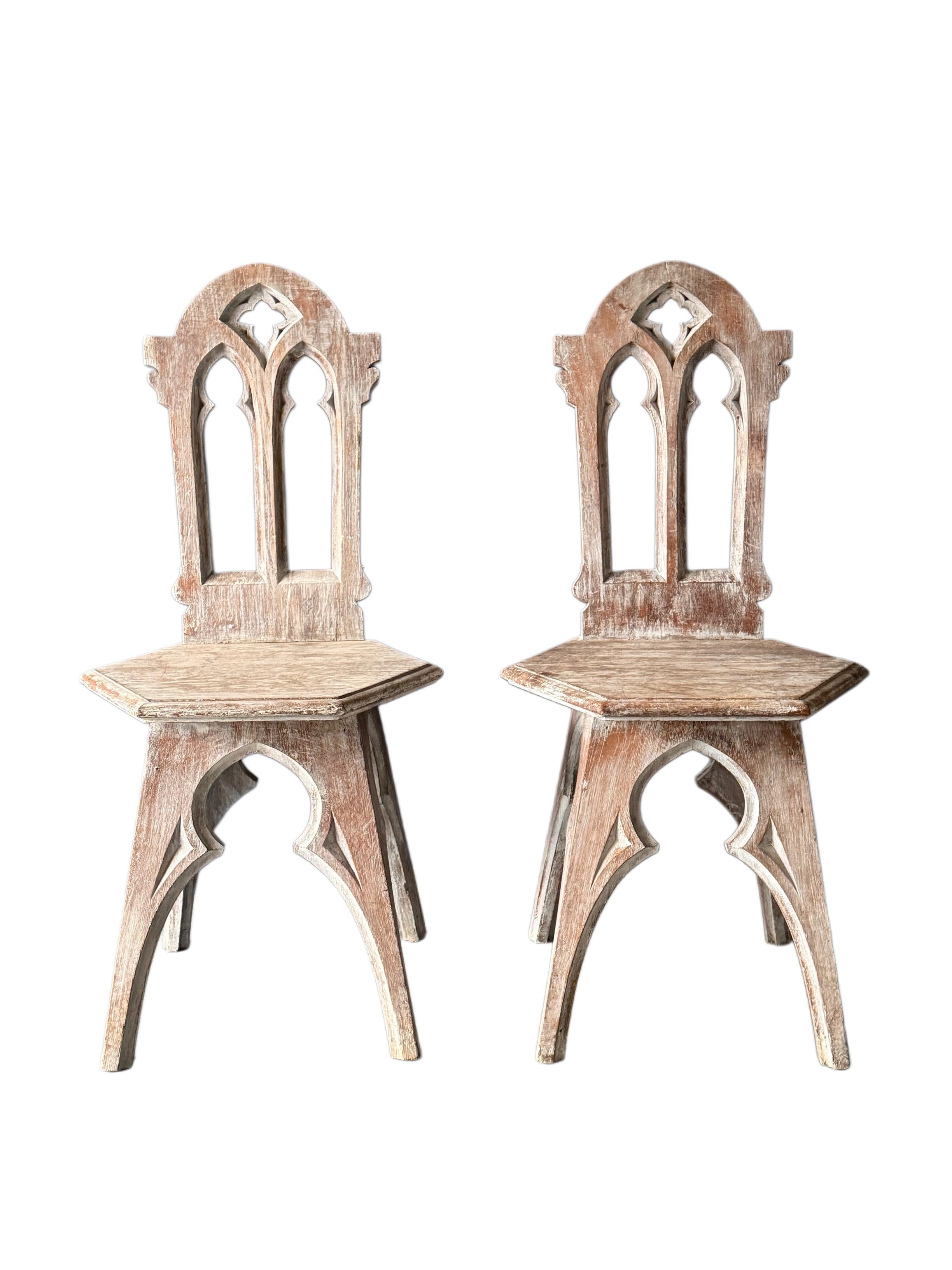 Pair of carved wooden Gothic-Revival chairs For Sale