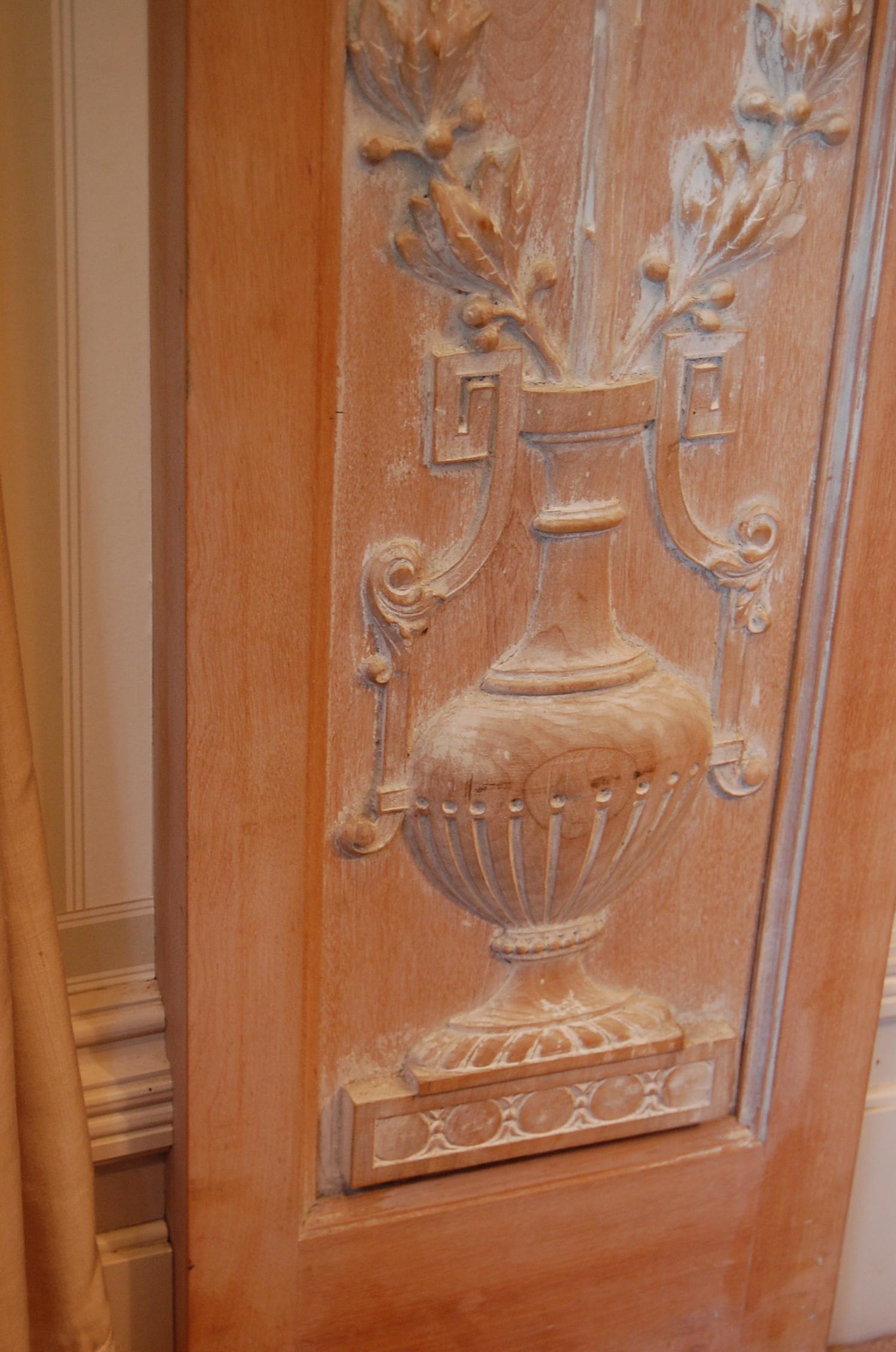 Early 20th Century Carved Wooden Pilasters Featuring Classic Urns with Intertwining Branches, Pair For Sale
