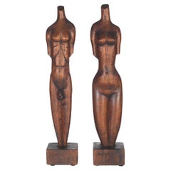 Pair of Carved Wooden Torso of a Female and Male