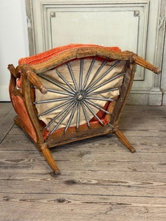 Pair of carved wooden transition armchairs, 18th century