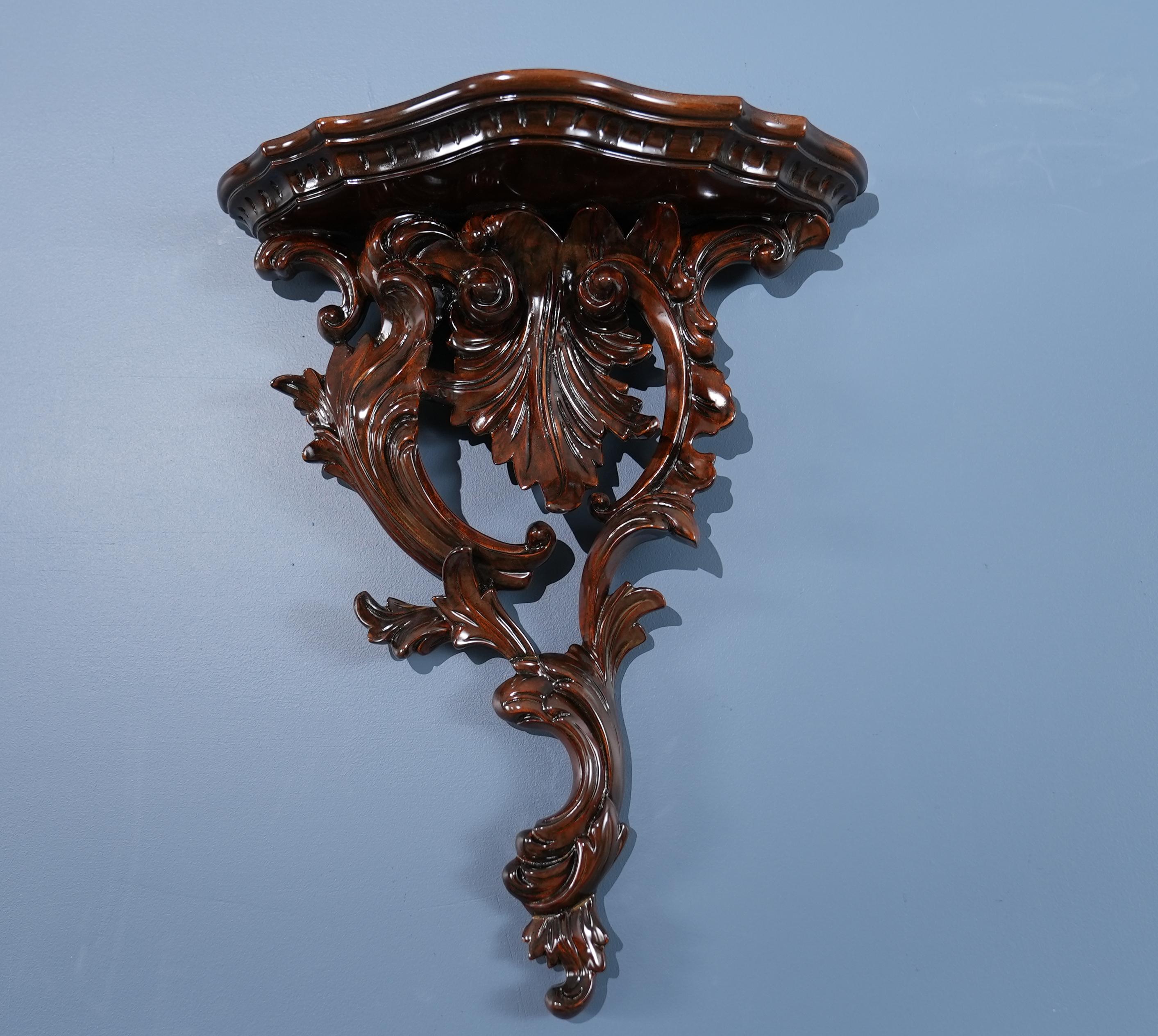These stylish and elegant, hand sculpted, Pair of Carved Wooden Wall Sconces bring a classic look to any home decor setting. It’s the perfect compliment to space, or to flank a mirror, window or painting. With the top shelf, you can display photos,
