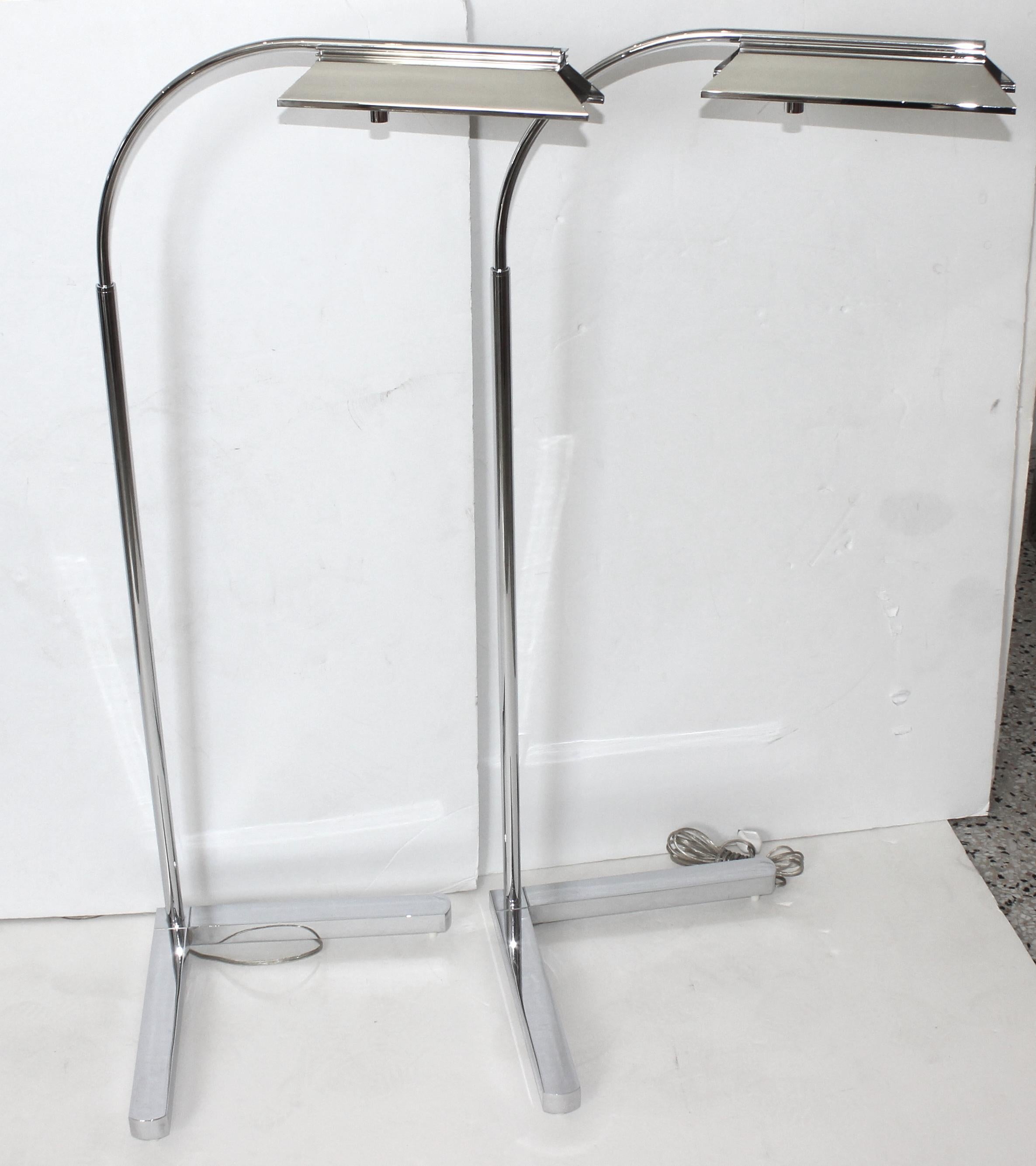 This stylish and chic pair of classic Casella adjustable floor lamps date to the 1980s-1990s and we have had them professional replated in nickel.

Note: Dimensions when it is at its lowest extensions is 42